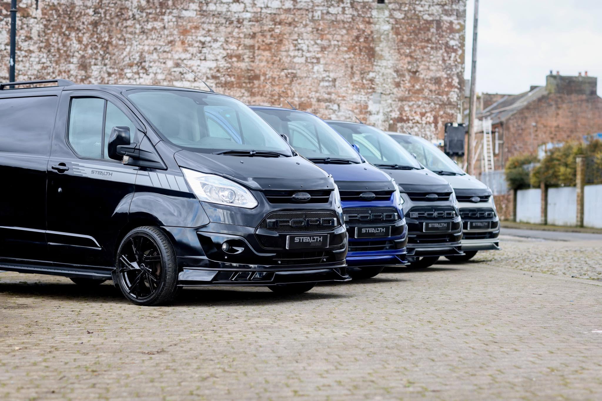 Line-up of customised Seventy3 STEALTH Ford Transit vans
